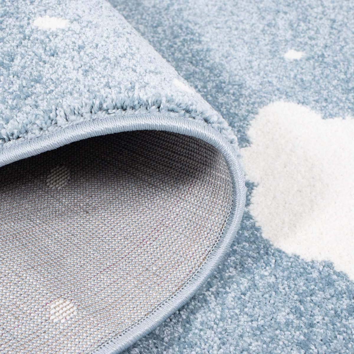 Alfombra infantil nube - Luna azul/crema - close up vouw Alfombra infantil nube - Luna azul/crema - close up vouw