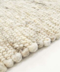 Alfombra de lana tejida a mano Ylva - Beige - close up zijkant, thumbnail