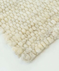 Alfombra de lana tejida a mano Veve - Beige/Crema - close up hoek, thumbnail Alfombra de lana tejida a mano Veve - Beige/Crema - close up hoek, thumbnail