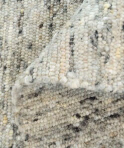 Alfombra de lana tejida a mano Veve - Gris/Crema - close up vouw, thumbnail Alfombra de lana tejida a mano Veve - Gris/Crema - close up vouw, thumbnail