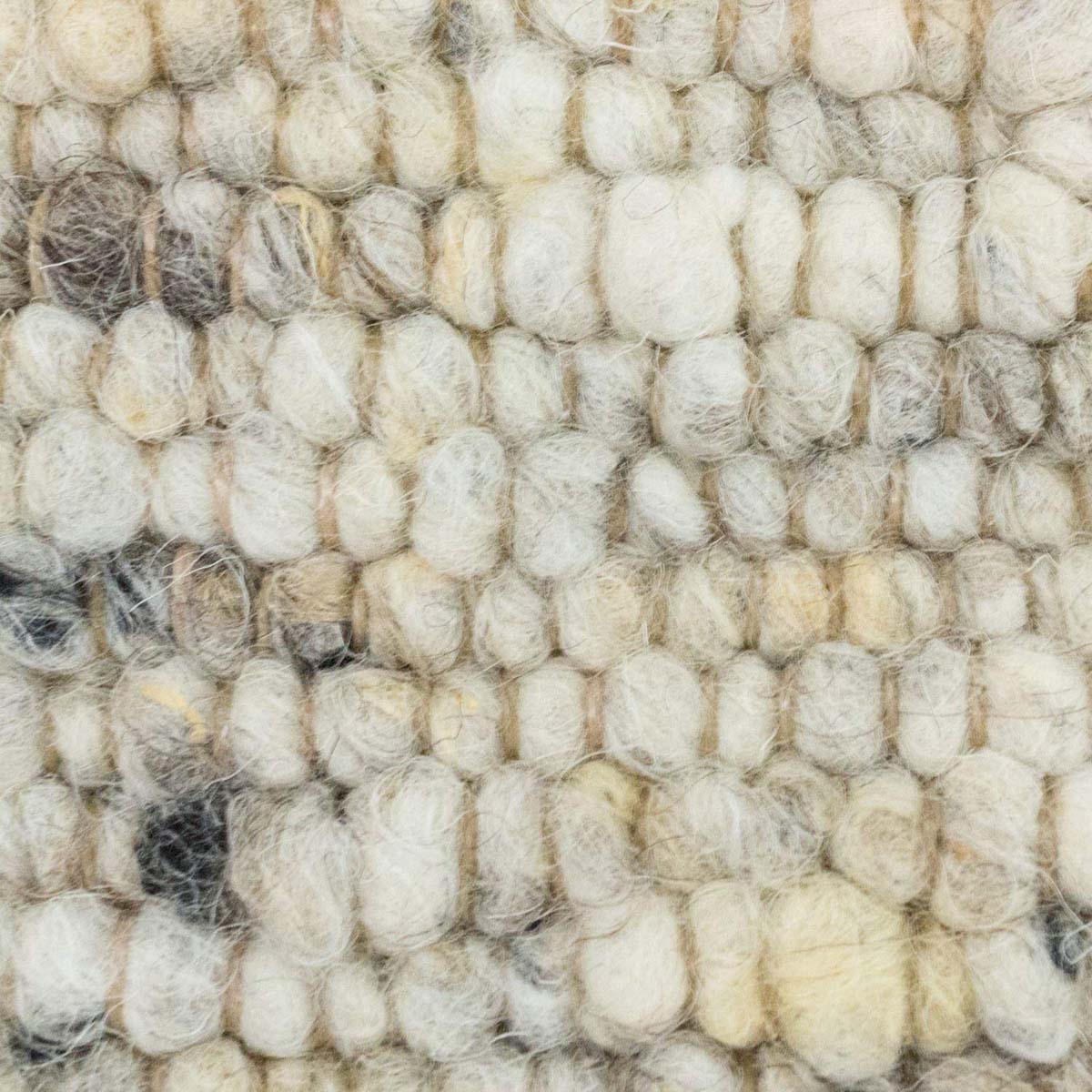 Alfombra de lana tejida a mano Veve - Beige/Gris - close up materiaal Alfombra de lana tejida a mano Veve - Beige/Gris - close up materiaal