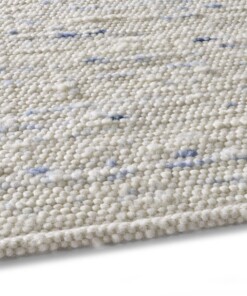 Alfombra de lana tejida a mano Oslo - Crema/Azul - close up zijkant, thumbnail Alfombra de lana tejida a mano Oslo - Crema/Azul - close up zijkant, thumbnail