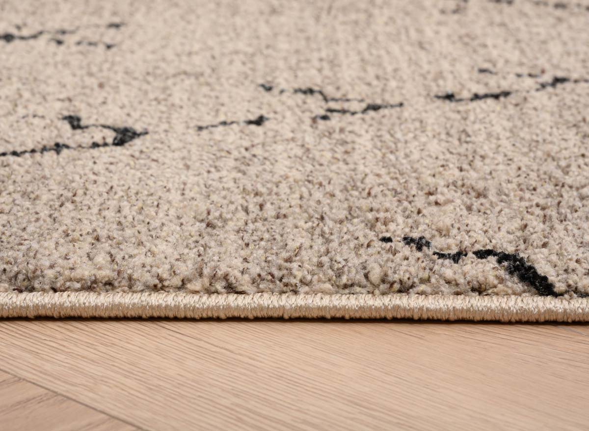 Alfombra bereber Beni Ouarain Sufian - Gris/Negro - close up zijkant Alfombra bereber Beni Ouarain Sufian - Gris/Negro - close up zijkant