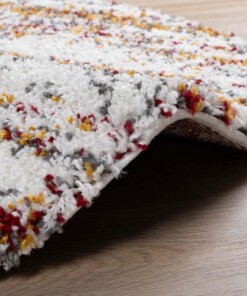 Alfombra redonda de pelo largo a rayas Artisan - Blanco/Multicolor - close up zijkant, thumbnail Alfombra redonda de pelo largo a rayas Artisan - Blanco/Multicolor - close up zijkant, thumbnail