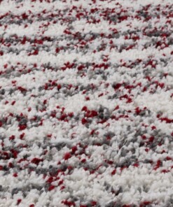 Alfombra redonda de pelo largo con topos Artisan - Gris/Rojo - close up materiaal, thumbnail Alfombra redonda de pelo largo con topos Artisan - Gris/Rojo - close up materiaal, thumbnail