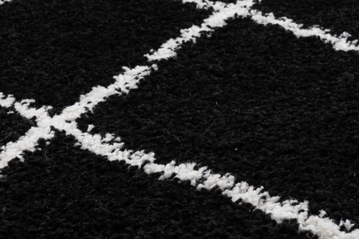 Alfombra redonda a rombos de pelo largo Artisan Artisan - Negro/Blanco - close up materiaal Alfombra redonda a rombos de pelo largo Artisan Artisan - Negro/Blanco - close up materiaal