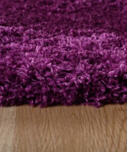 Alfombra ovalada de pelo largo - Cozy Shaggy Violeta - close up zijkant, thumbnail Alfombra ovalada de pelo largo - Cozy Shaggy Violeta - close up zijkant, thumbnail