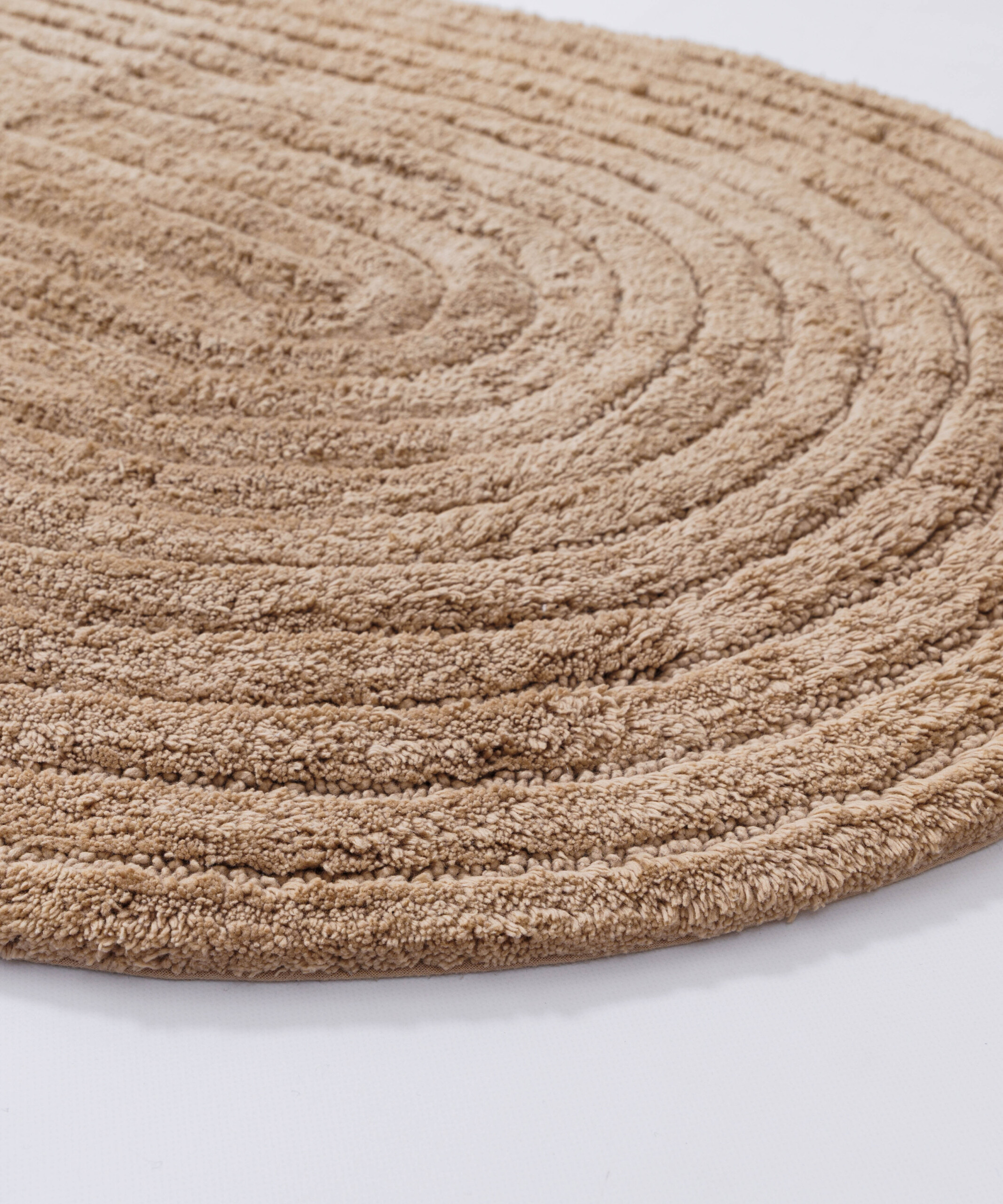 Ovale Badematte - Stille Beige - close up Ovale Badematte - Stille Beige - close up