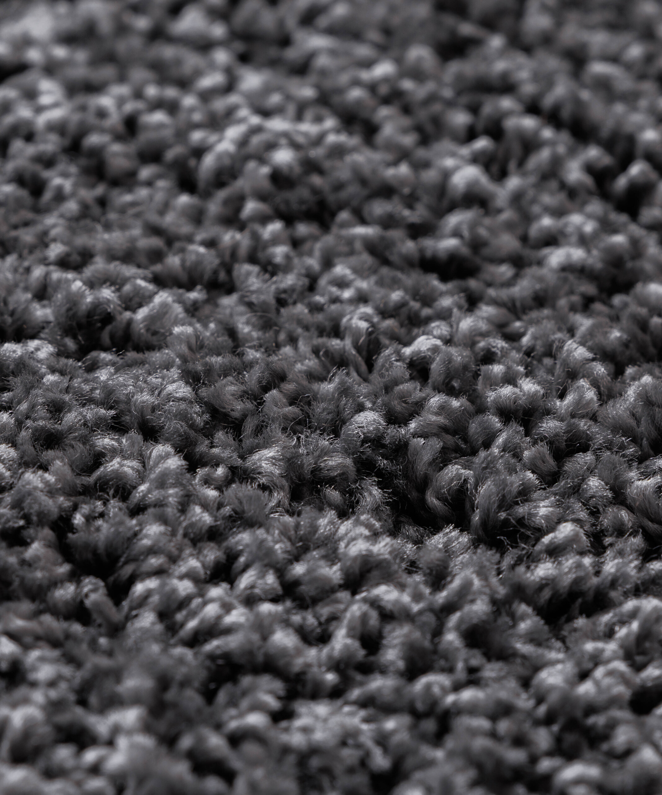 Alfombra redonda de pelo largo Shaggy Grand - Gris oscuro - close up Alfombra redonda de pelo largo Shaggy Grand - Gris oscuro - close up