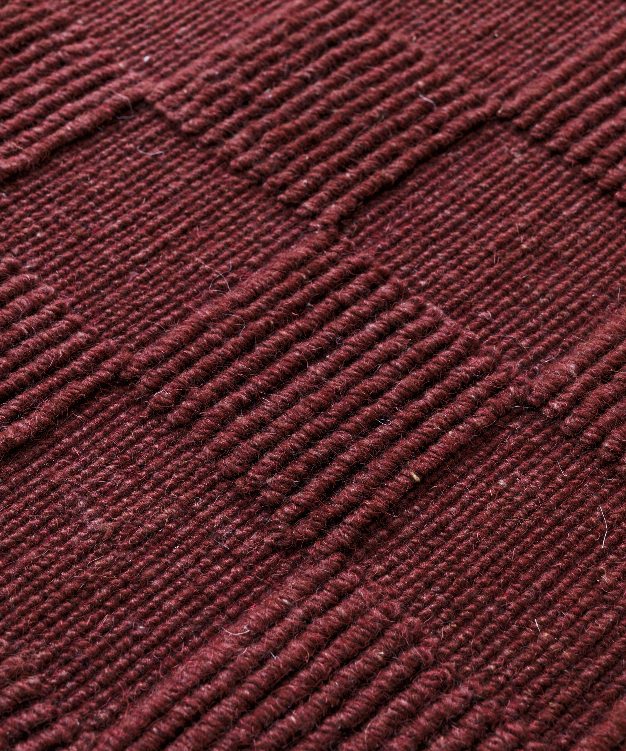 Alfombra de lana - Tavle burdeos - close up Alfombra de lana - Tavle burdeos - close up